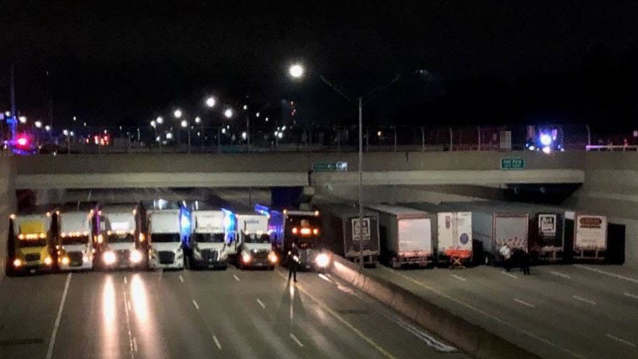 Semi-Trucks Line Up On Freeway To Prevent Suicide (Video)