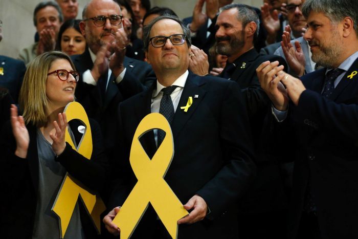 Catalonia: Quim Torra vows to put Carles Puigdemont back in power