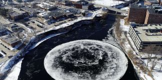 Spinning ice disc forms in Maine river (Watch)