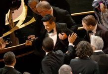 Rami Malek Falls Off Stage After Oscar Win (Picture) Rami Malek Falls Off Stage After Oscar Win (Picture)