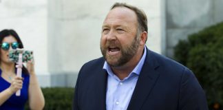 Alex Jones blames Sandy Hook conspiracy claims on ‘psychosis’, Report Alex Jones blames Sandy Hook conspiracy claims on 'psychosis', Report