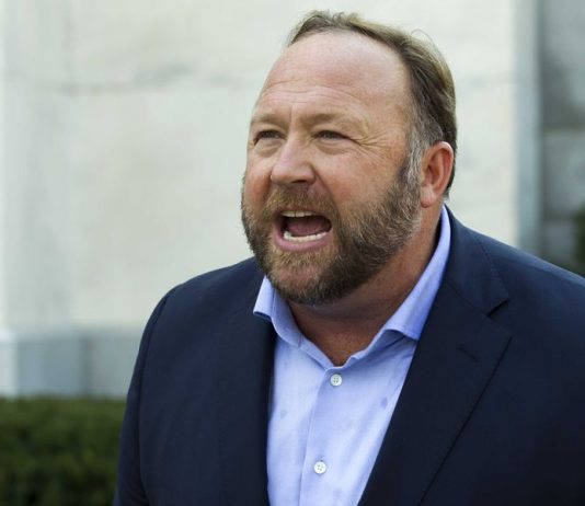 Alex Jones blames Sandy Hook conspiracy claims on ‘psychosis’, Report Alex Jones blames Sandy Hook conspiracy claims on 'psychosis', Report