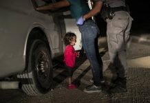 John Moore: ‘Crying girl’ picture near border wins World Press Photo John Moore: 'Crying girl' picture near border wins World Press Photo