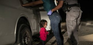 John Moore: 'Crying girl' picture near border wins World Press Photo