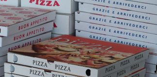 Just Pizza boxes advertise shelter dogs for adoption NY pizza shop is putting photos of dogs awaiting adoption