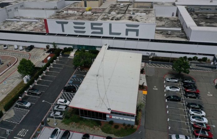 Coronavirus USA Updates California authorities says Tesla can reopen factory with new safety measures