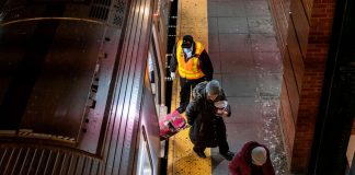 Coronavirus USA Updates: NYPD clears people from subway during start of overnight shutdown