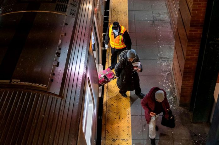 Coronavirus USA Updates: NYPD clears people from subway during start of overnight shutdown
