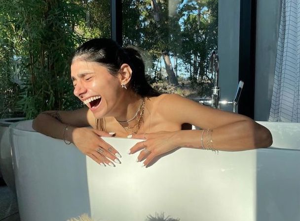 Pornhub star Mia Khalifa strips naked for cheeky bathroom snap in the sun