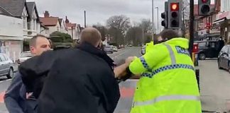 Watch: Police officer punches cafe worker as venue packed with 100 customers Watch: Police officer punches cafe worker as venue packed with 100 customers